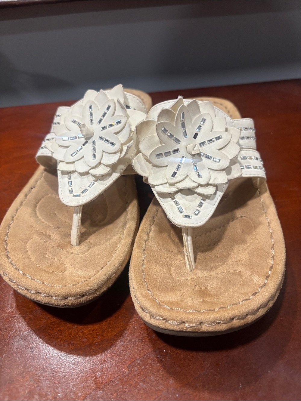 Women’s sandals by cliffs